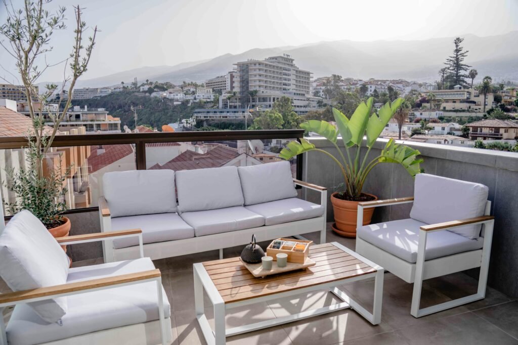 Acanva Vento Modular Aluminum Outdoor Sofa with teak wood grain design, weather-resistant aluminum frame, and modular patio seating for outdoor spaces