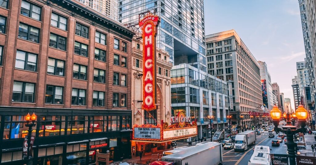 Bustling downtown Chicago street featuring iconic Chicago Theatre on a lively evening.