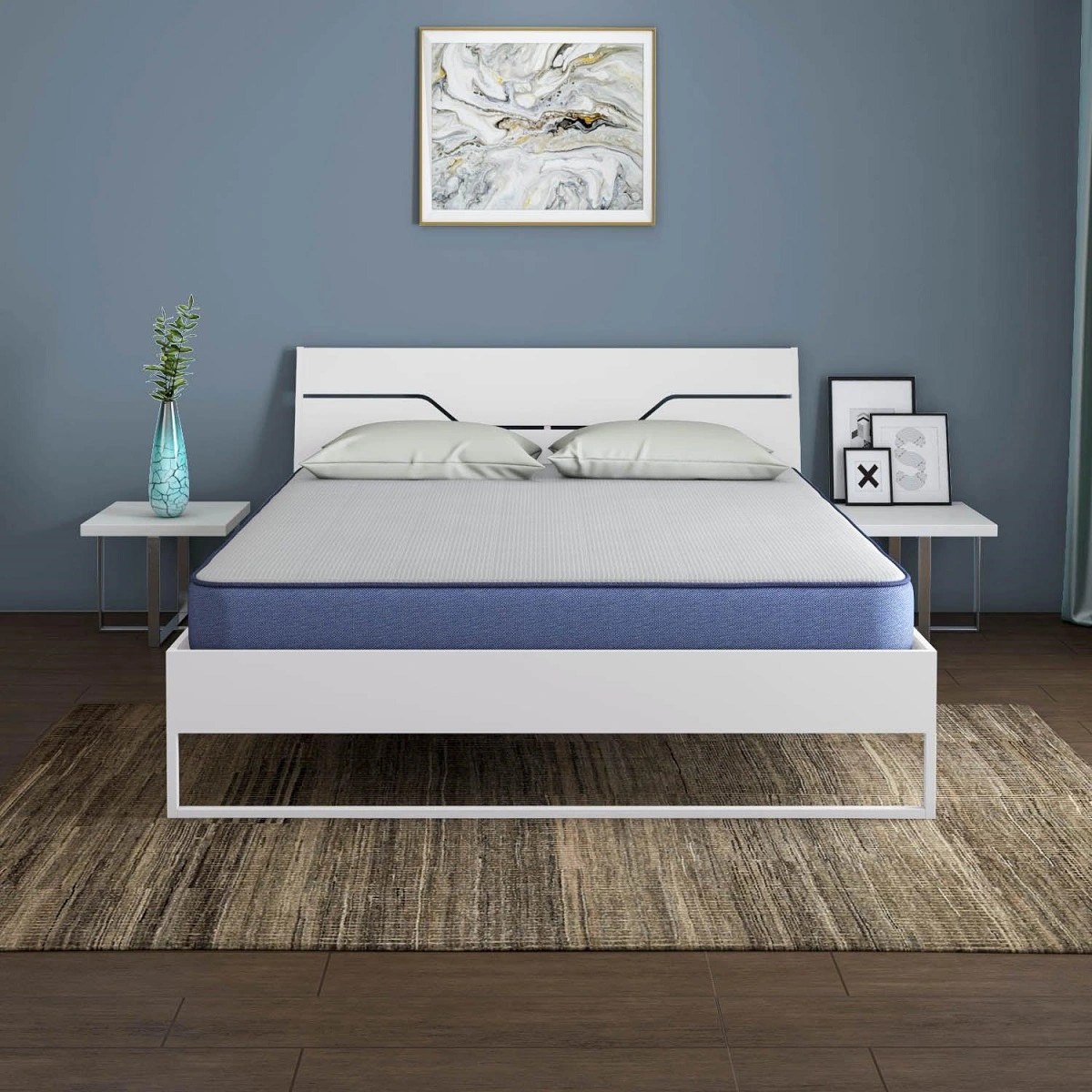 Queen hybrid mattress with cooling gel memory foam and pocket springs on a white metal bed frame