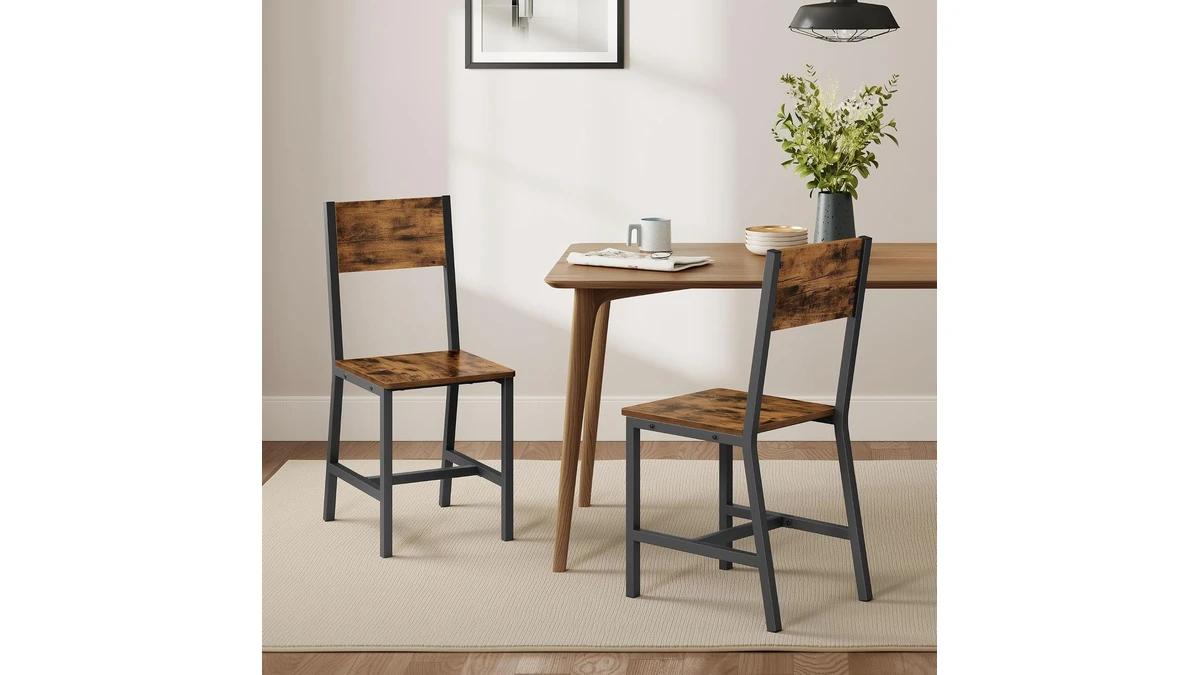 Two VASAGLE dining chairs with rustic brown wood seats and backs on black steel frames, beside a small dining table